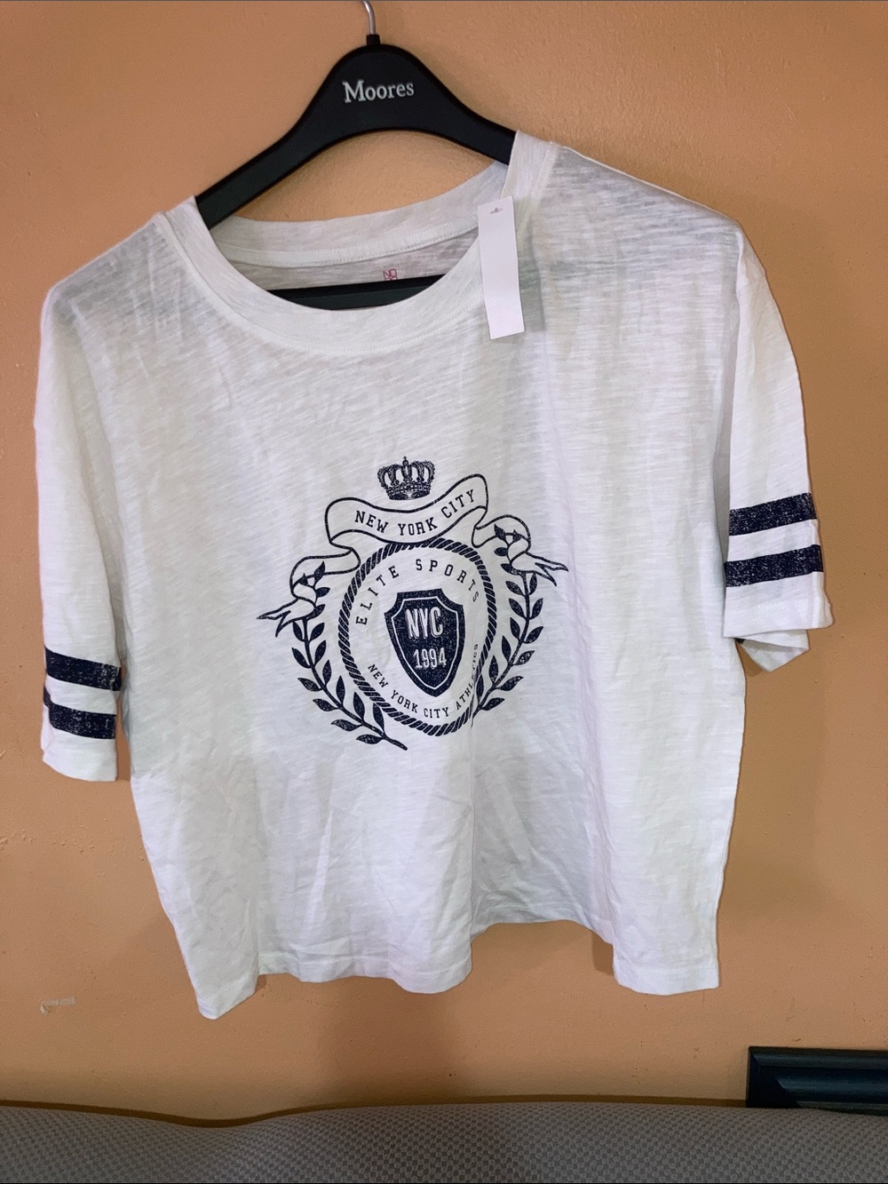 No Boundaries White Tee with Navy Crest and Stripes